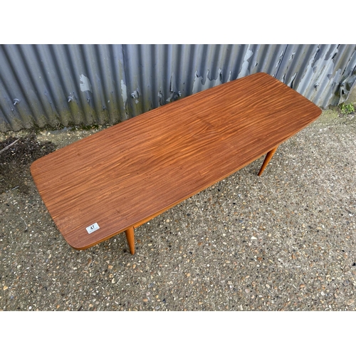 47 - A long teak plank top table with slatted under shelf