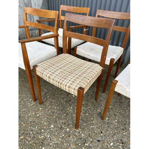 76 - A set of five danish teak chairs by TROEADS all with original upholstery underneath later cream cove... 