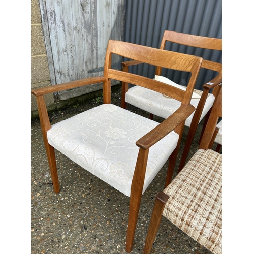 76 - A set of five danish teak chairs by TROEADS all with original upholstery underneath later cream cove... 