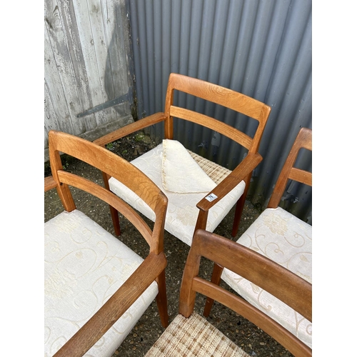 76 - A set of five danish teak chairs by TROEADS all with original upholstery underneath later cream cove... 