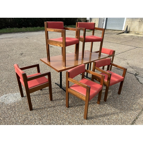 83 - A mid century teak table 76x154 together with a set of Swedish style teak framed carver chairs with ... 