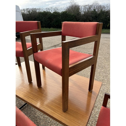 83 - A mid century teak table 76x154 together with a set of Swedish style teak framed carver chairs with ... 