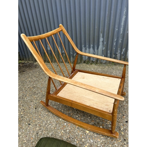 96 - Retro teak framed rocker chair