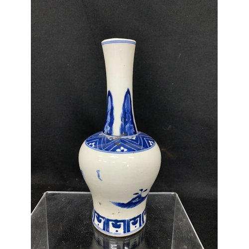 464 - Oriental blue and white vase, decorated with figures, height 25cms