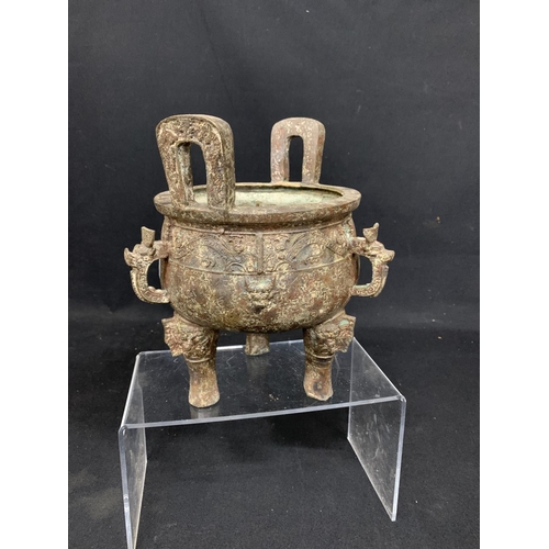 469 - Bronze archaic pot on 3 legs, diameter 17cms