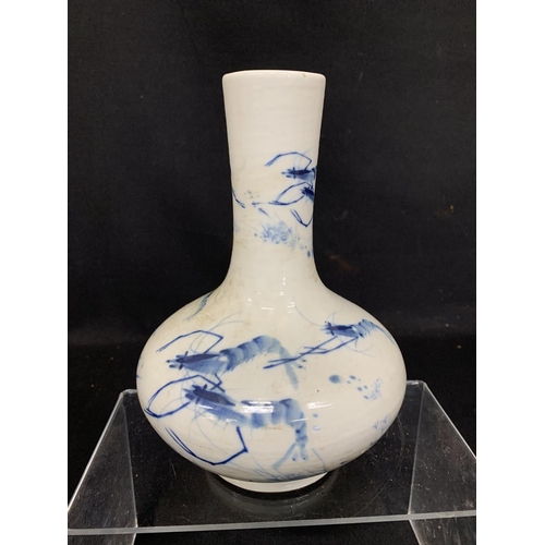 471 - Oriental crayfish Pattern blue and white vase, height 22cms