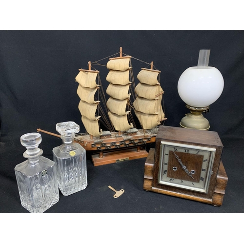 508 - Model Galleon, oil lamp, wooden mantel clock with pendulum and key and 2 Decanters (3)