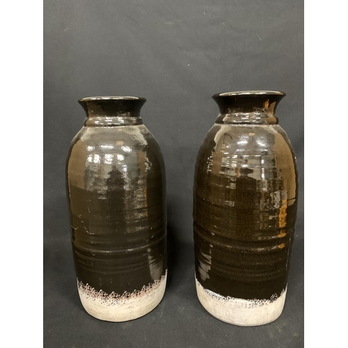 510 - Pair of tall pottery vases, height 46cms