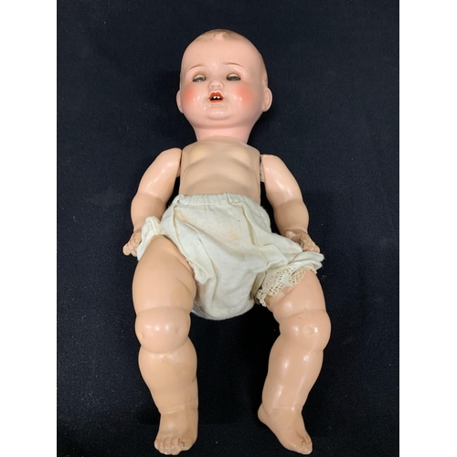 513 - Baby doll marked AM, height 43cms