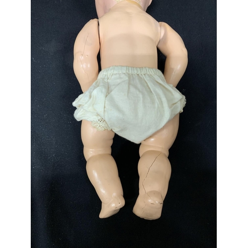 513 - Baby doll marked AM, height 43cms