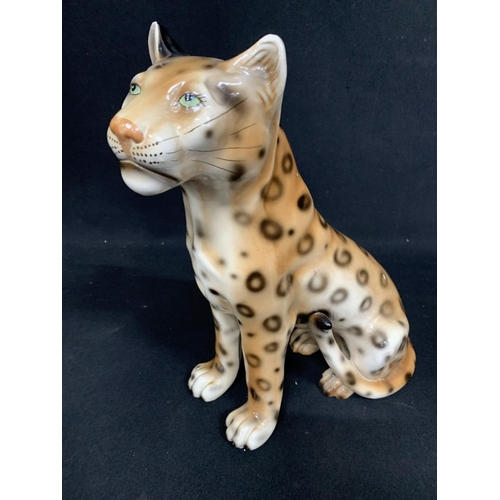 560 - Porcelain Leopard Figure, height 35cms