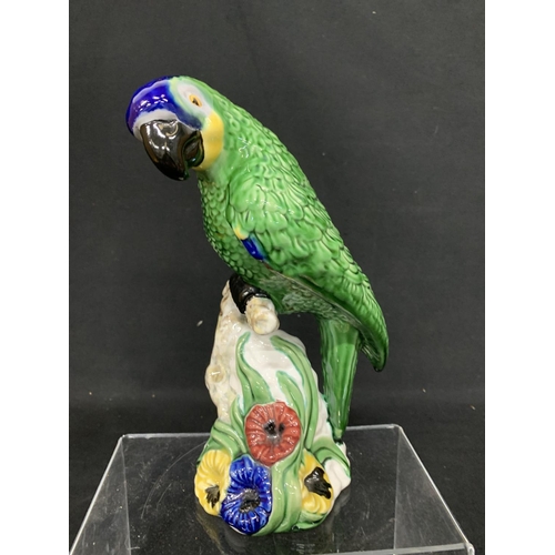 562 - Portuguese china  Parrot figure, height 28cms