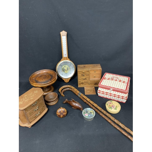 719 - Woodenware including Barometer and two banded walking Sticks