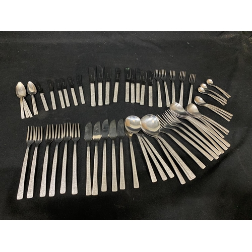 724 - 63 pieces of Viners Studio Cutlery