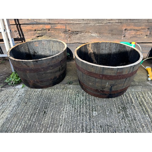 320A - A pair of Scottish oak half whisky Barrell planters