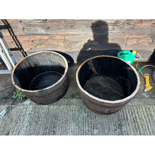 320A - A pair of Scottish oak half whisky Barrell planters