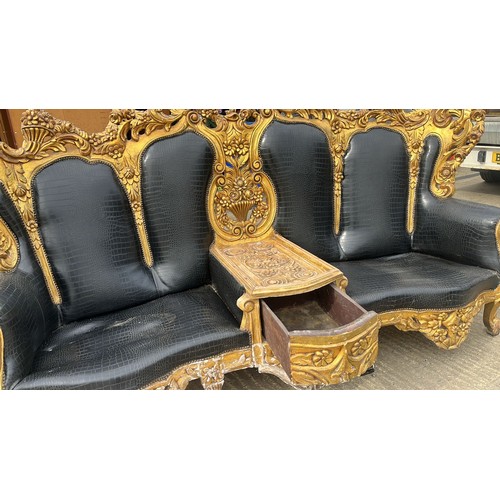 300C - A highly onrate and very impressive  gold gilt double sided love seat / club seating