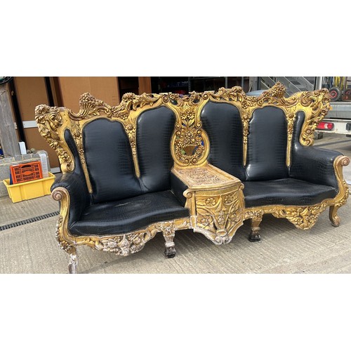 300C - A highly onrate and very impressive  gold gilt double sided love seat / club seating