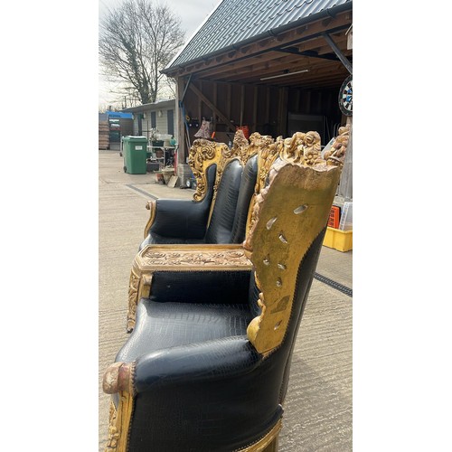 300C - A highly onrate and very impressive  gold gilt double sided love seat / club seating