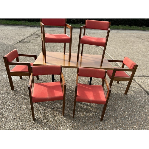 98A - A mid century teak table 76x154 together with a set of Swedish style teak framed carver chairs with ... 