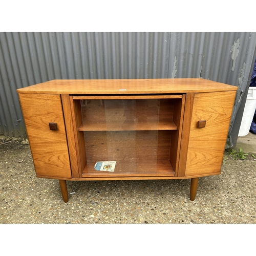 100 - A 1960's SURELINE drinks cabinet sideboard with revolving front reveal bar section 120x 78x 45