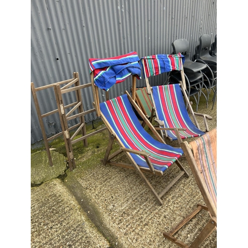 137 - Four vintage deck chairs and airer