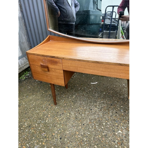 14 - A teak mid century dressing table with mirror