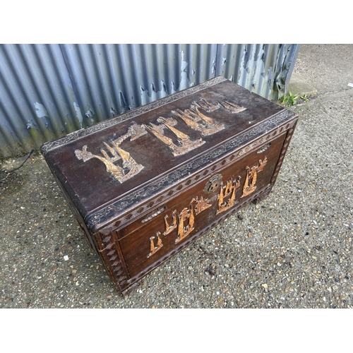 156 - An oriental camphor wood blanket box  103x52x6