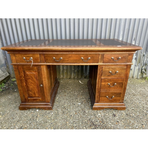 159 - A modern reproduction twin pedestal desk with three section leather top  138x77x80