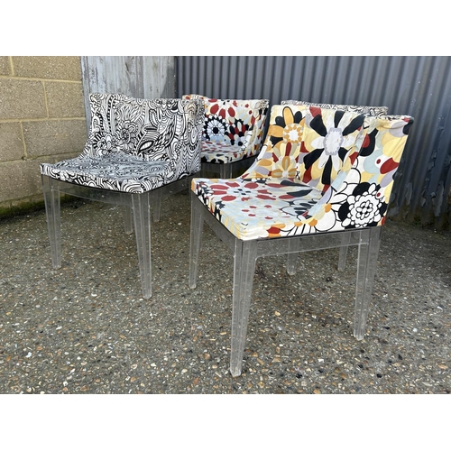 163 - A set of four Perspex framed designer chairs