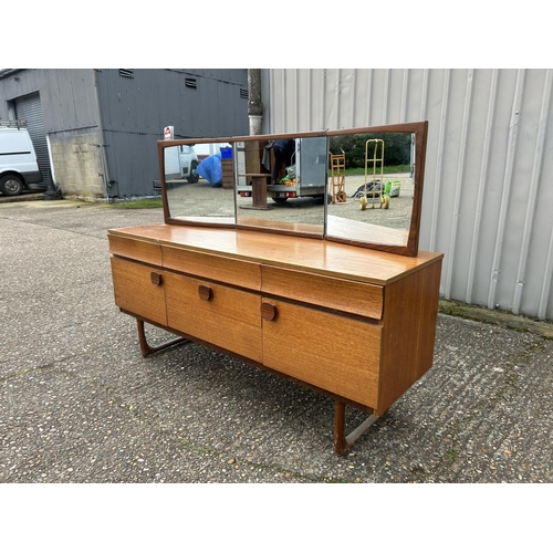2 - A mid century teak six drawer dressing chest