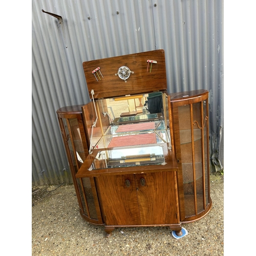 201 - A 1920's walnut cocktail drinks / display cabinet