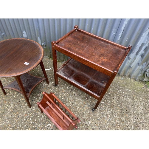 21 - Mahogany occasional table, oak trolley and a magazine rack