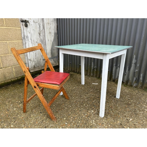24 - Vintage kitchen table and a folding chair