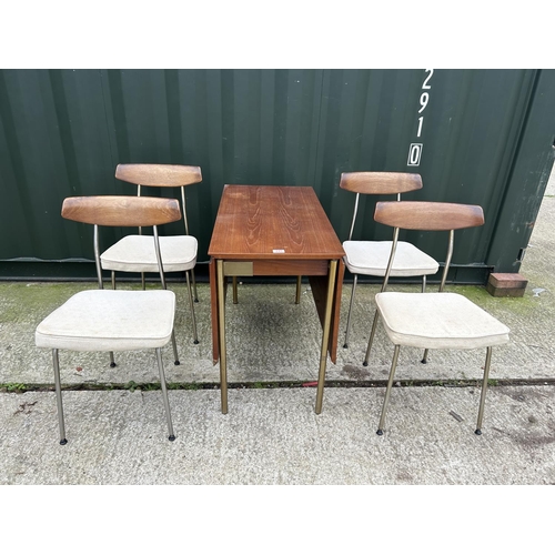 245 - A mid century JOHN & SYLIVA READ STAG s range drop leaf table together with four chairs