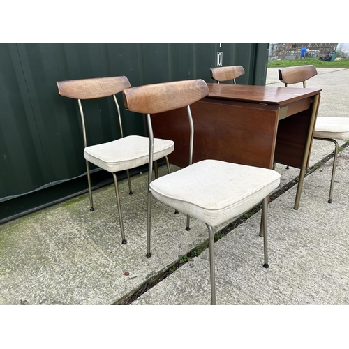 245 - A mid century JOHN & SYLIVA READ STAG s range drop leaf table together with four chairs