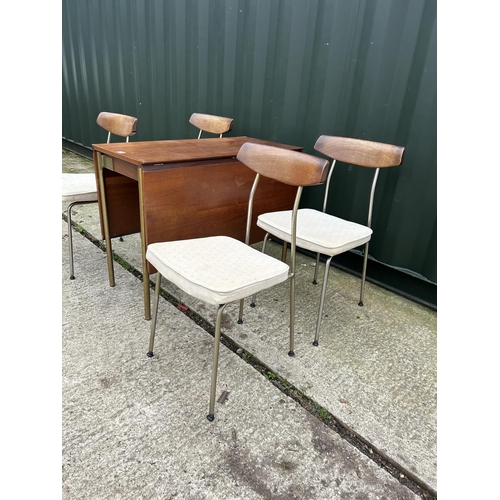 245 - A mid century JOHN & SYLIVA READ STAG s range drop leaf table together with four chairs