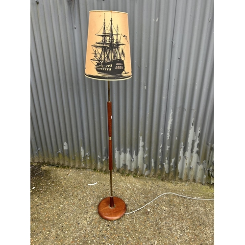 27 - A retro teak standard lamp