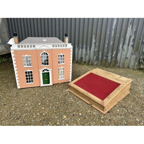 34 - A vintage dolls house together with a pine writing slope
