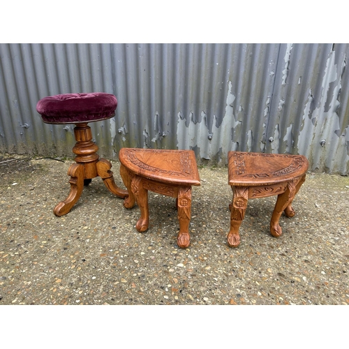 39 - A telescopic swivel piano stool and two carved tables