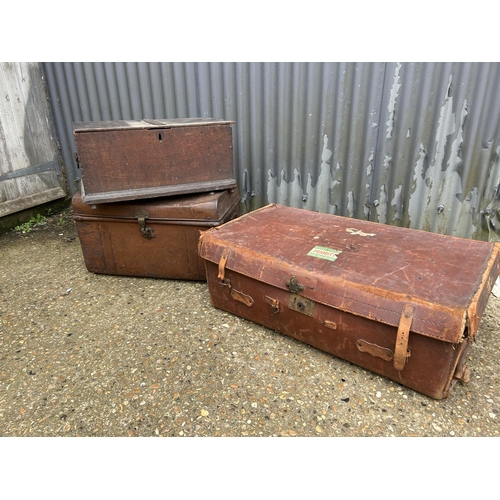 48 - A vintage tin trunk, wooden box and a leather case