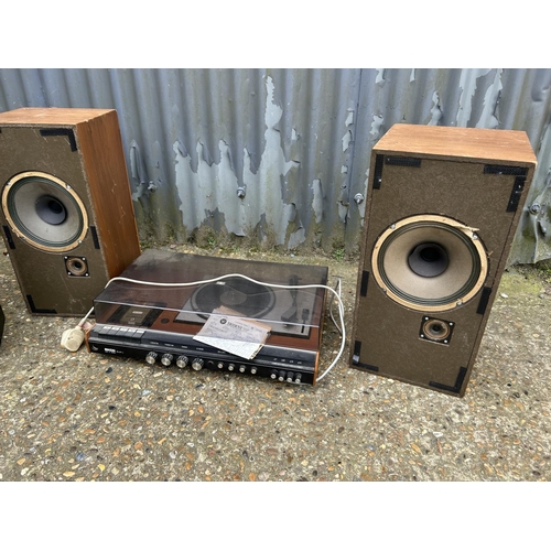 50 - A teak ECKO record deck together with a sharp stereo