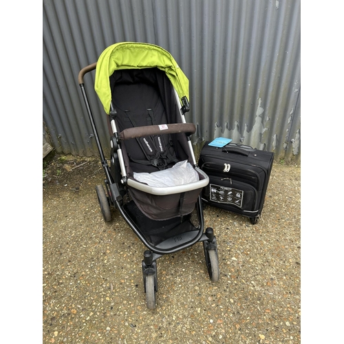57 - Pushchair and new suitcase