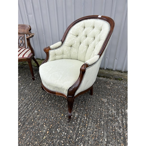 7 - A Victorian upholstered button back chair together with an inlaid chair