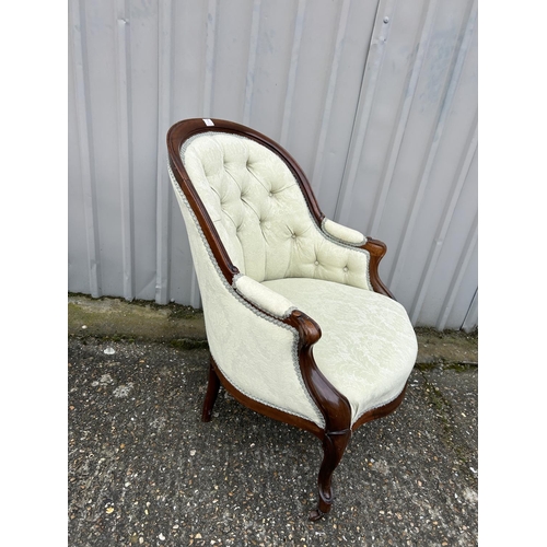 7 - A Victorian upholstered button back chair together with an inlaid chair