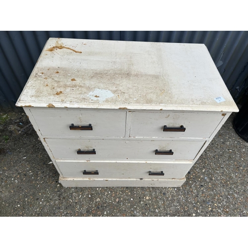 70d - A white painted pine chest of four drawers