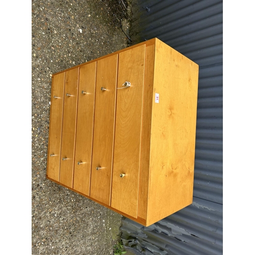 91 - A retro ply chest of drawers 76x40x95