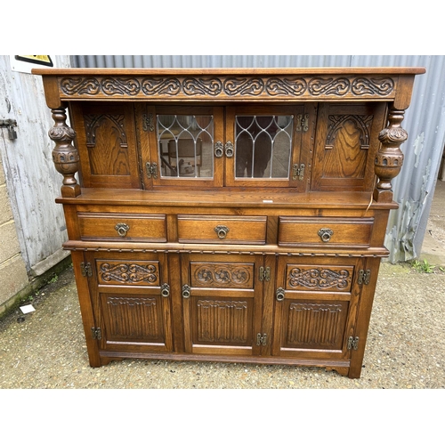 93 - A large old charm carved oak court cupboard 137x46x138