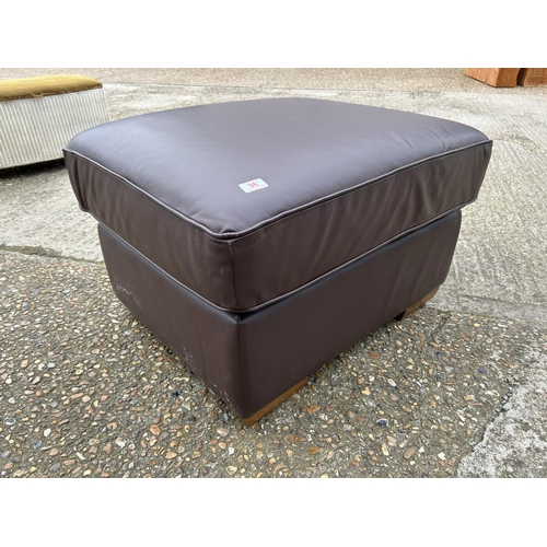 96 - A brown leather footstool