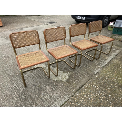 98 - A set of four mid century chairs with begere seats